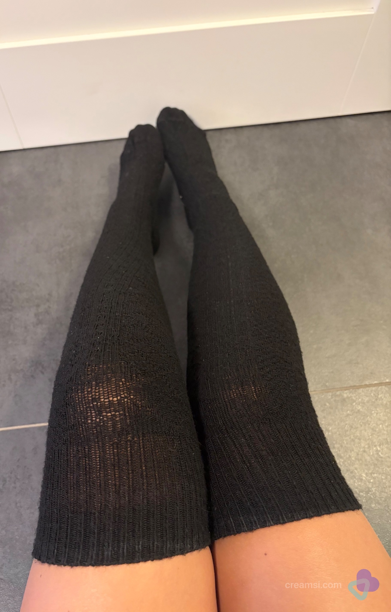 Schwarze Overknee Stricksocken
