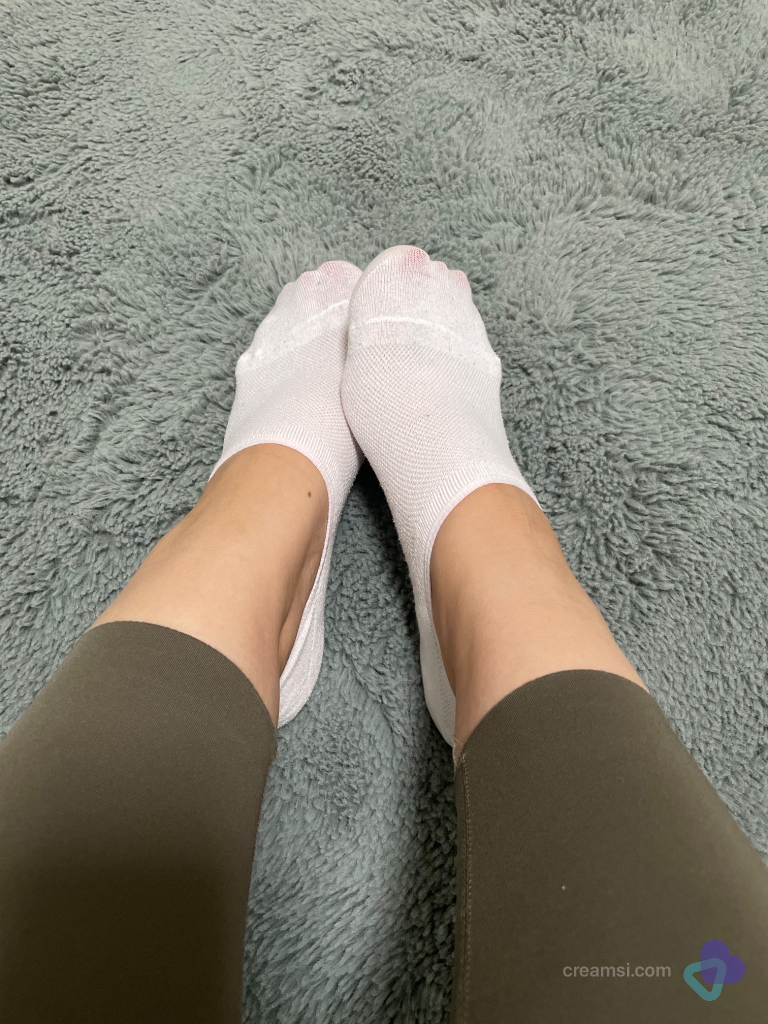 Getragene Sportsocken
