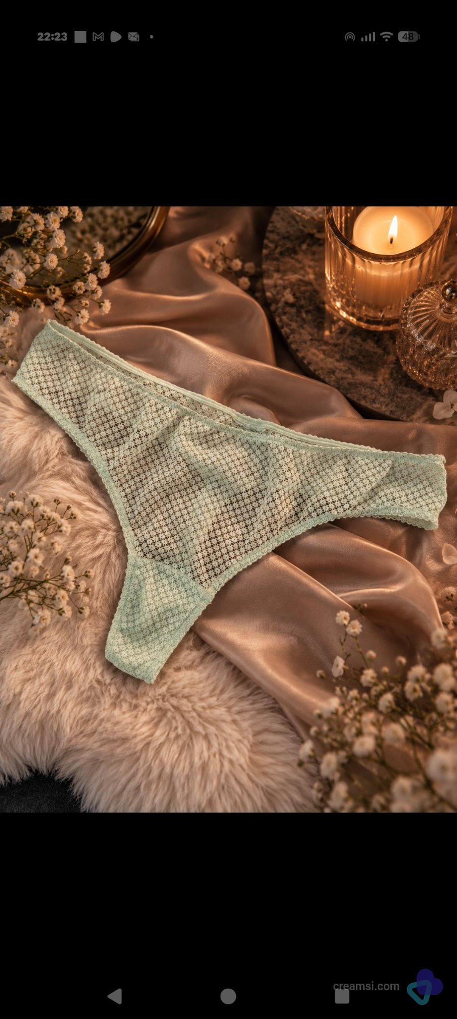 Zarter Spitzen-String in Creme/Weiß